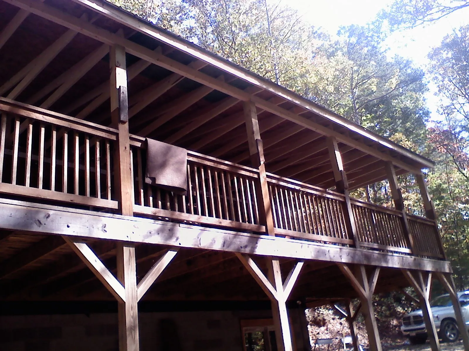 Timber framing under a new elevated porch and deck — Roof Leak Repair in Centerport by Roofing Brothers